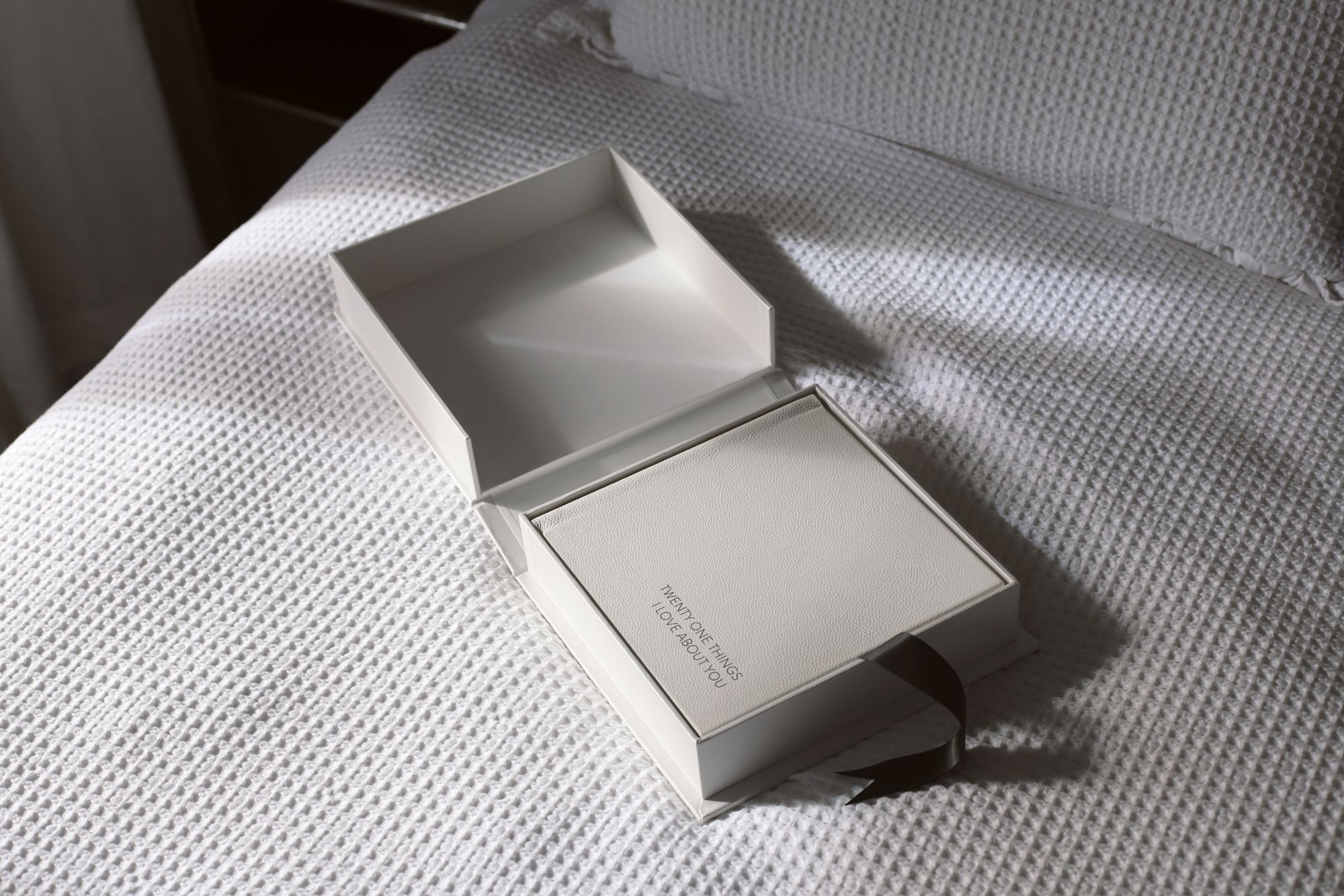 MILK Book sitting inside a presentation box