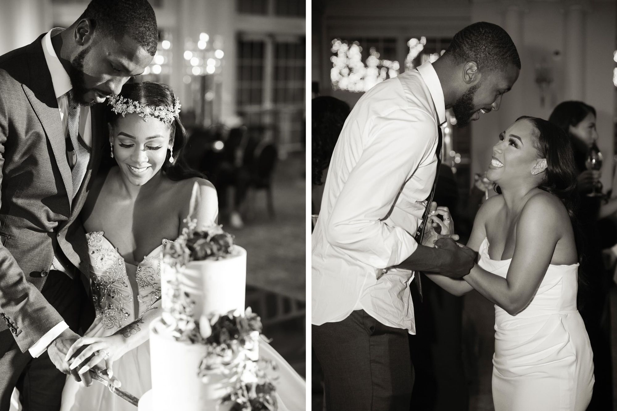 A newlywed couple cutting a simple, smooth white, three-tiered wedding cake with flowers adorned throughout.