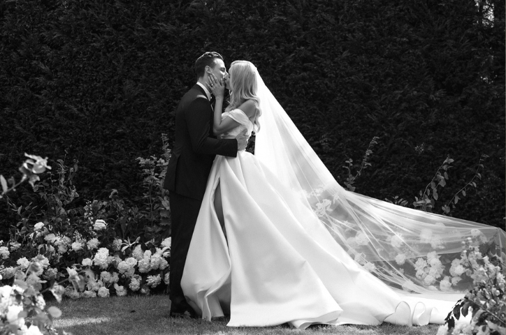 Couple kissing at the alter