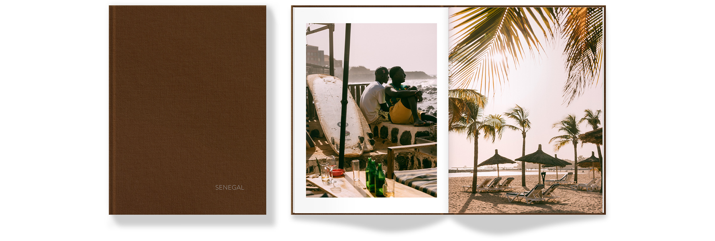 Open Portrait Photo Book with photos of beach in Senegal on double-page spread.