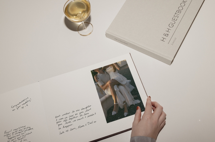 Wedding guest book layed out on table