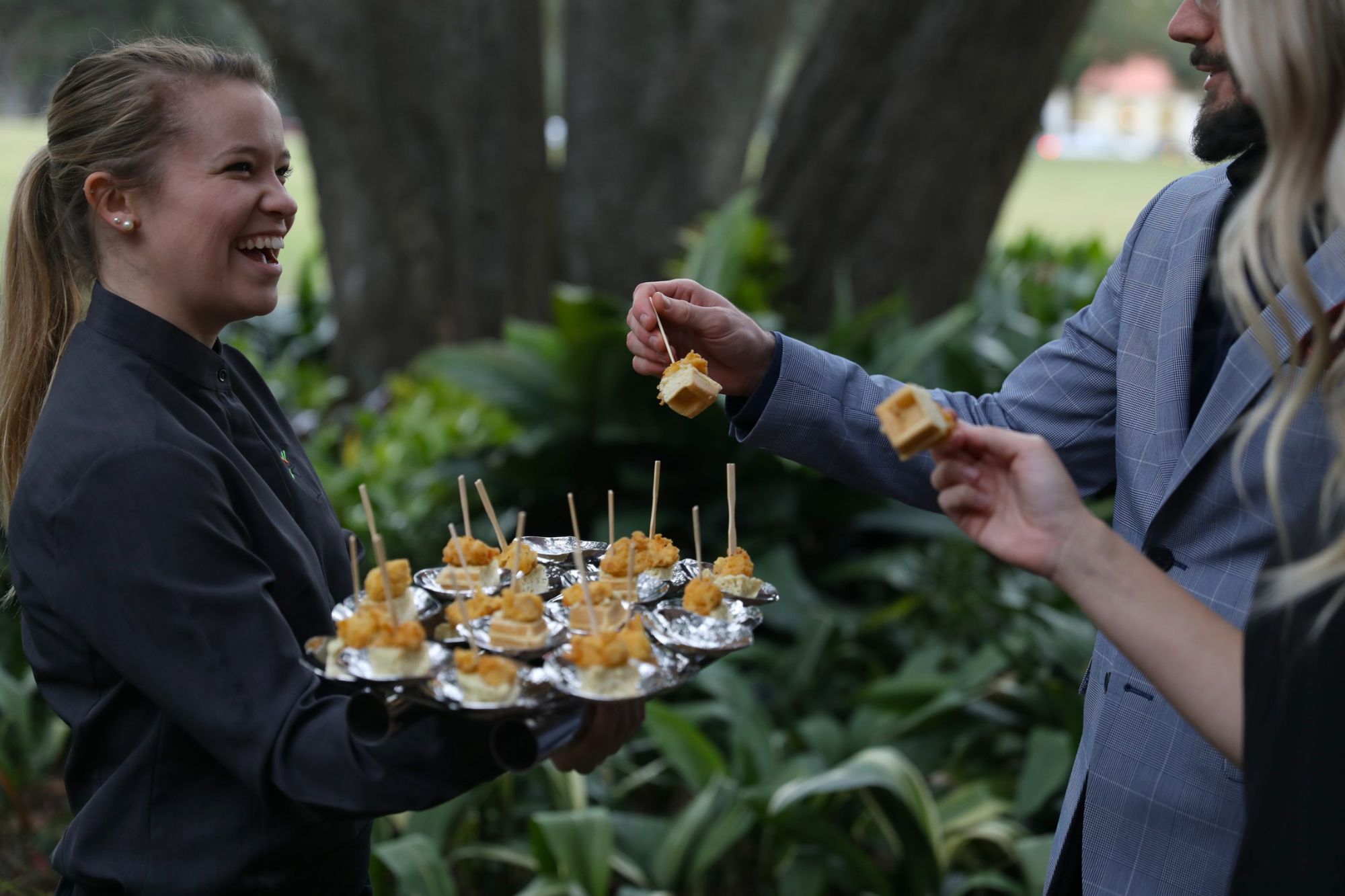 Person handing out nibbles