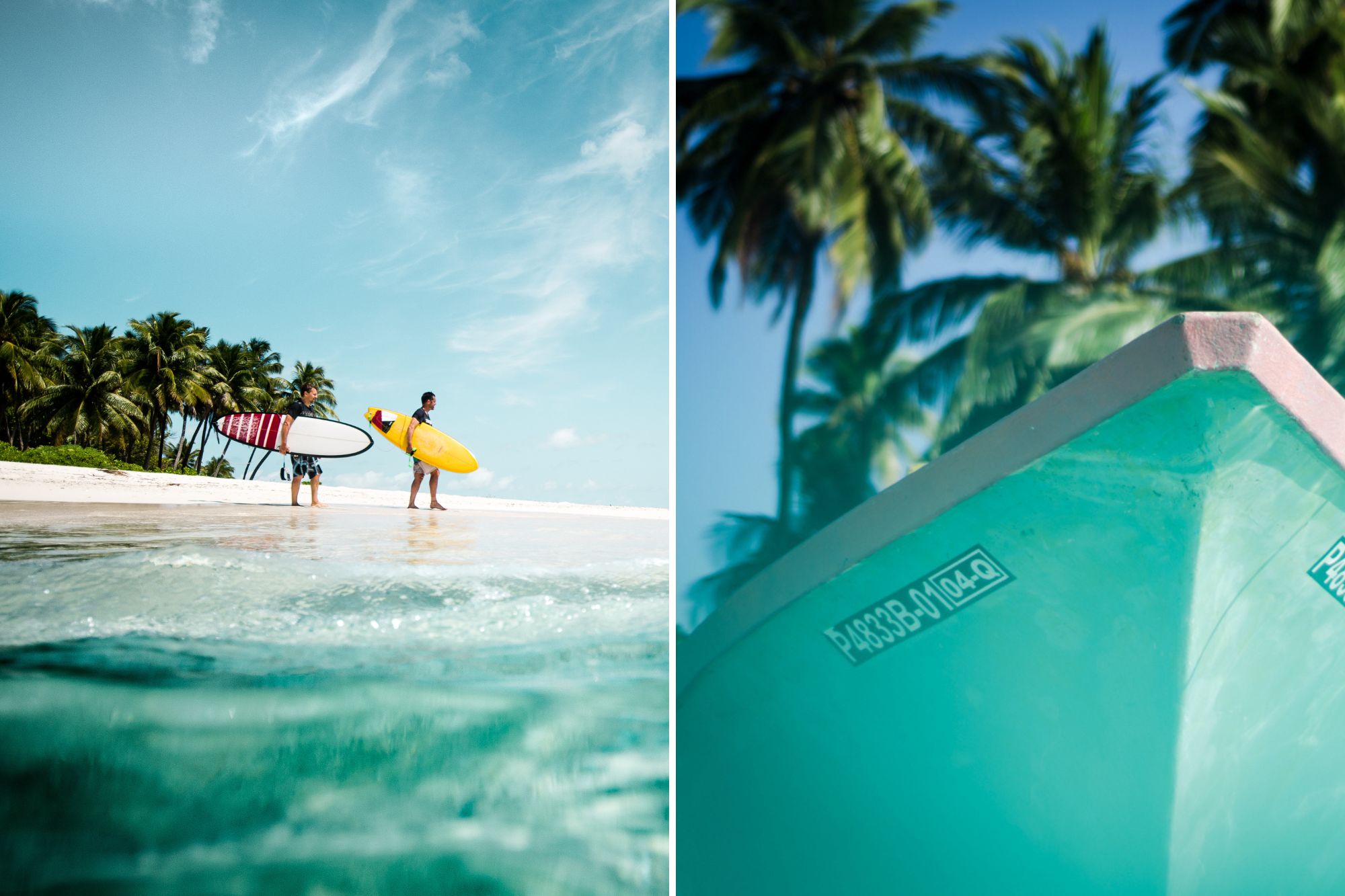 Two surfers standing with boards under arm at edge of shore on tropical coastline.