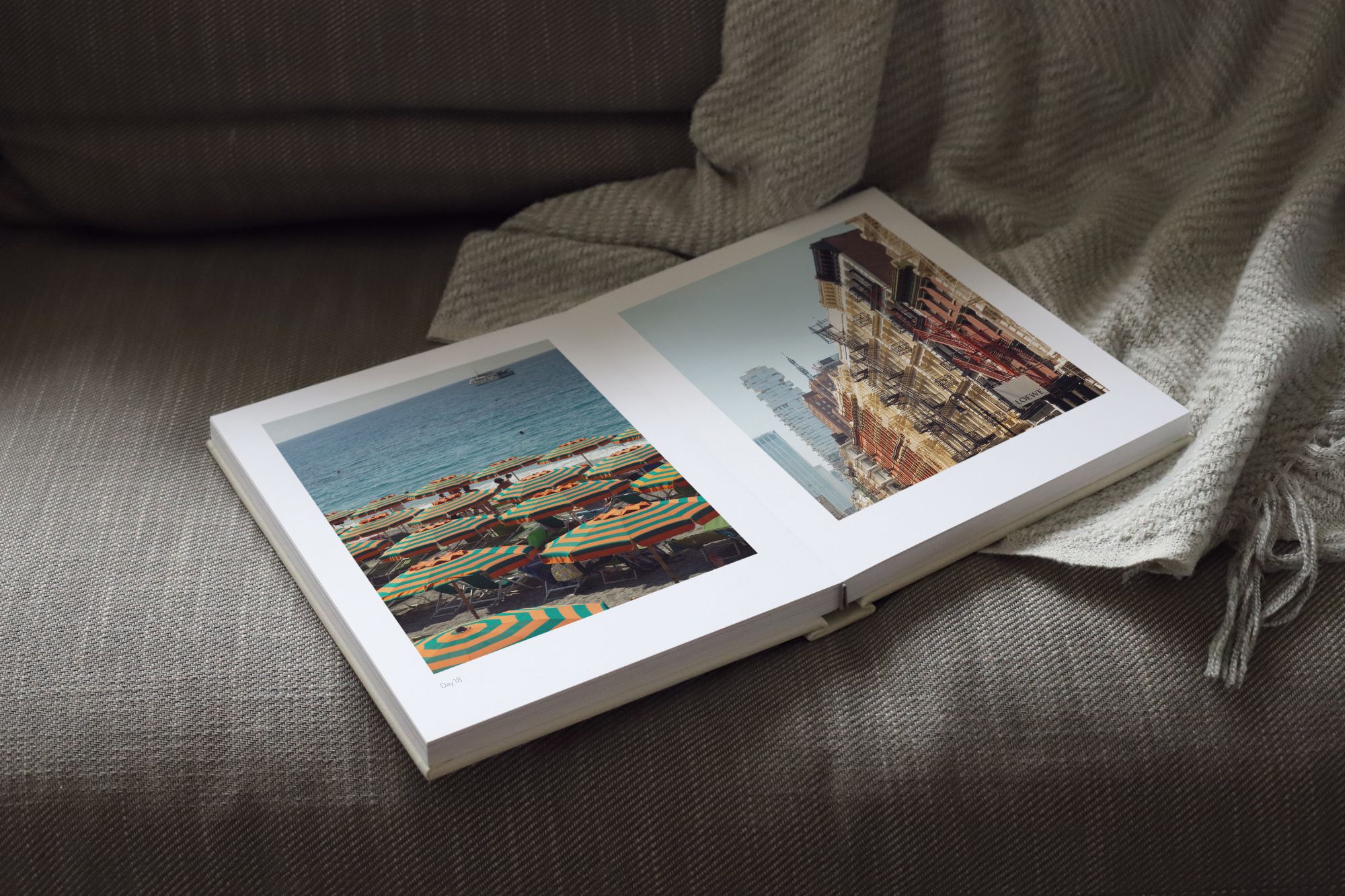 Open Square Premium Photo Album with photos of Italian beach inside double page spread.