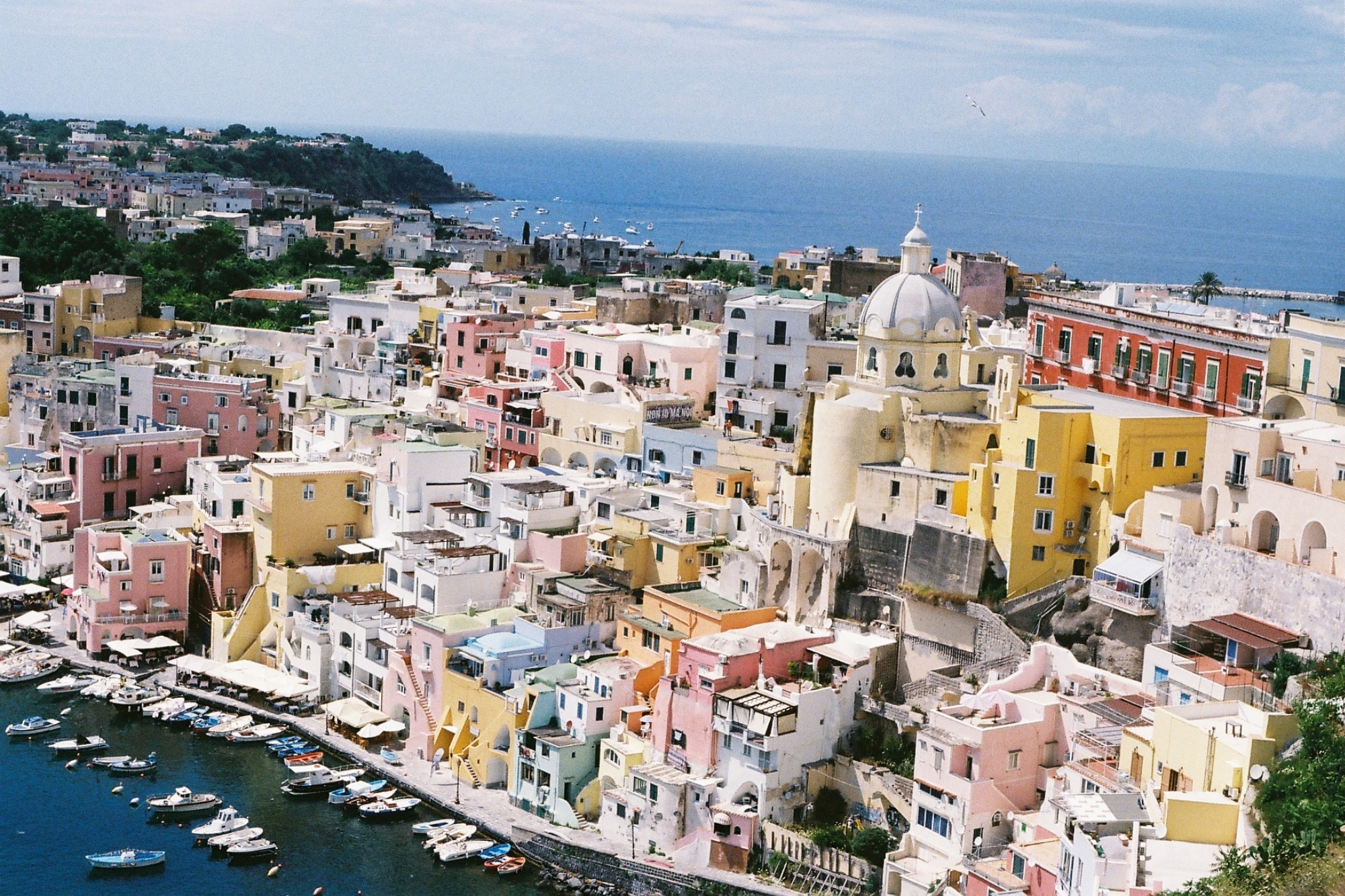 Birds eye view of colourful European buildings on a cliff