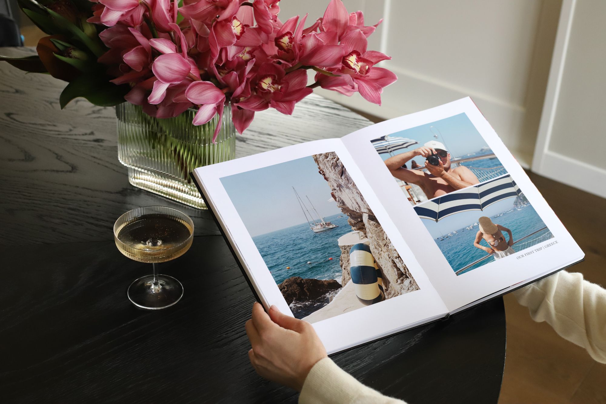 Book open with photos of couples honeymoon in beach
