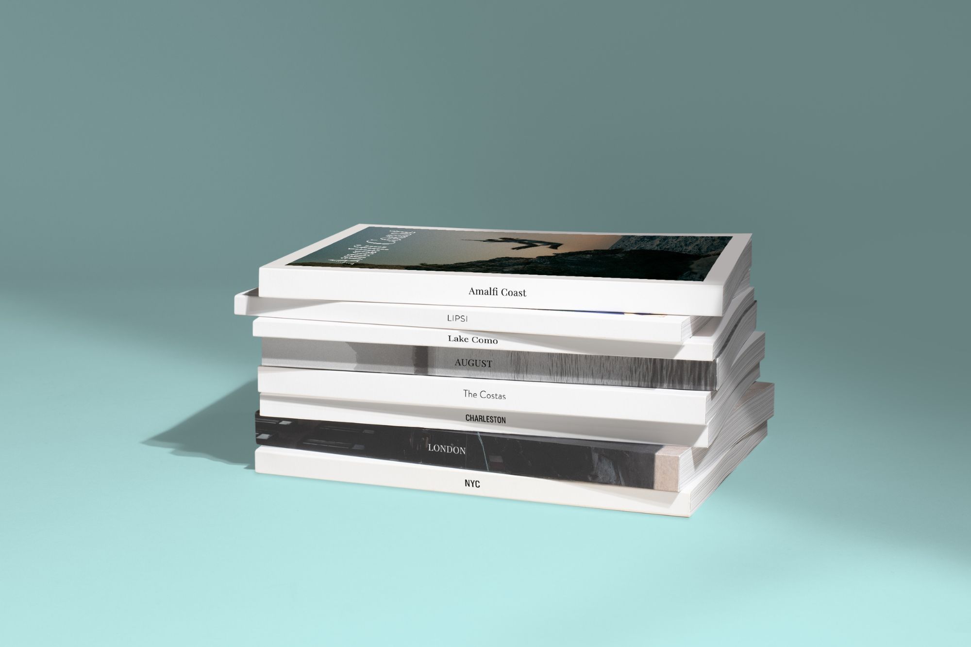 a stack of custom photo magazines