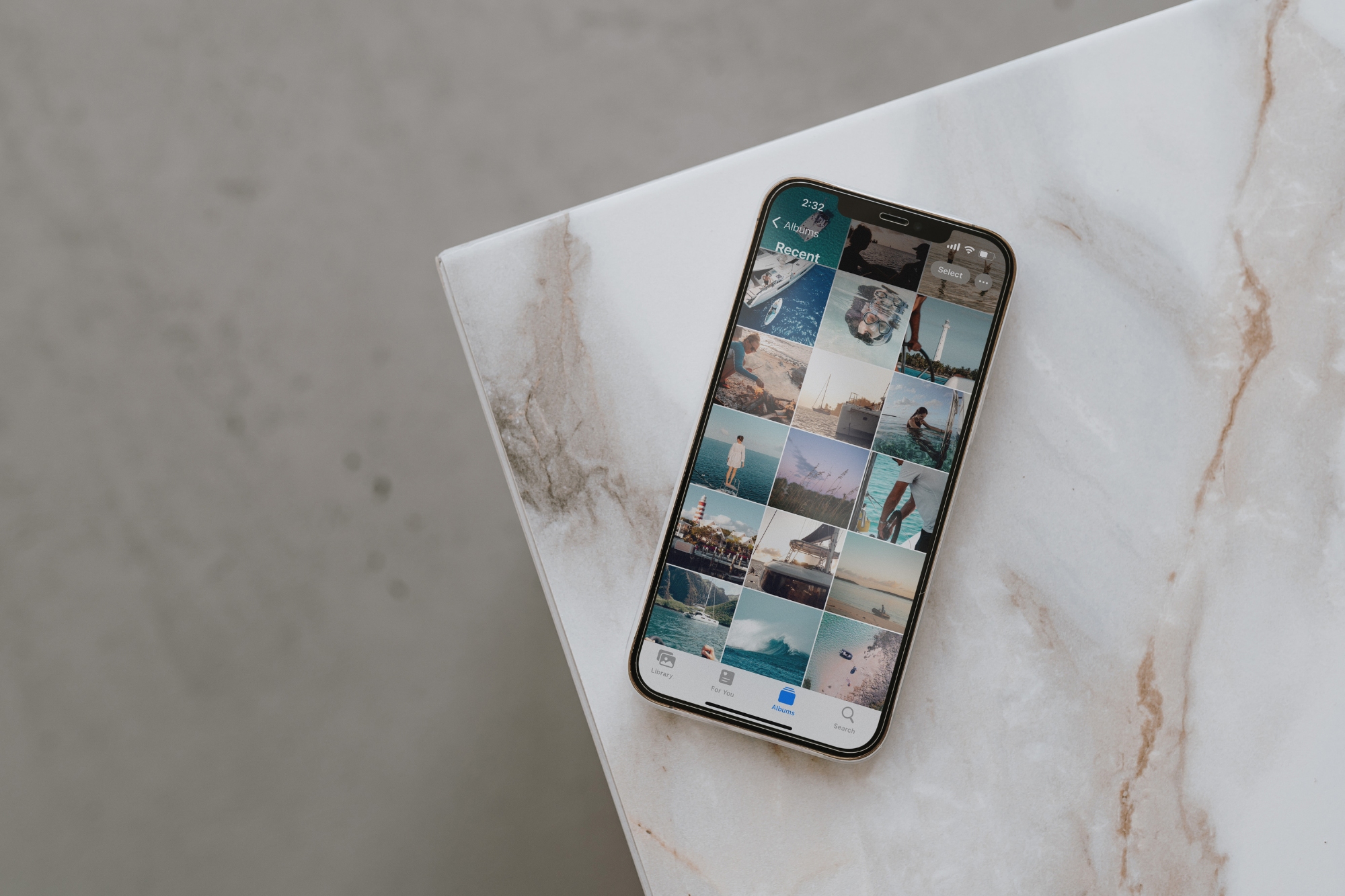 Iphone with apple photos open on the counter