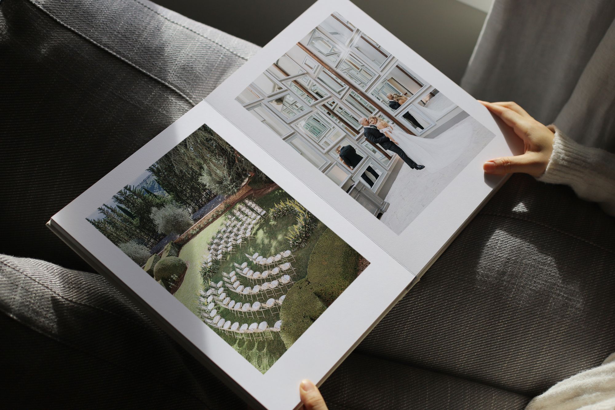 hands flicking through custom wedding album