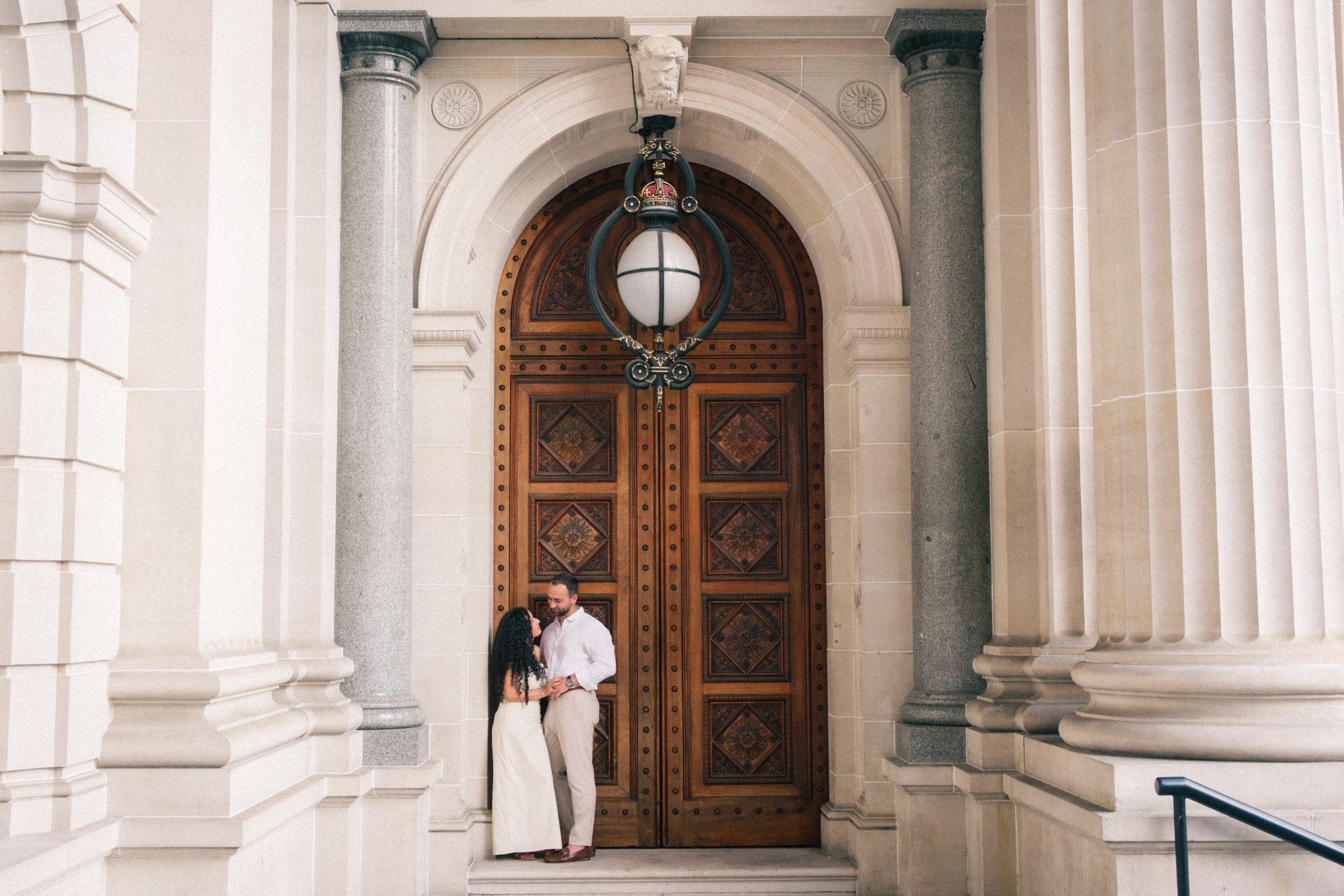photo of a bride and groom outside a church