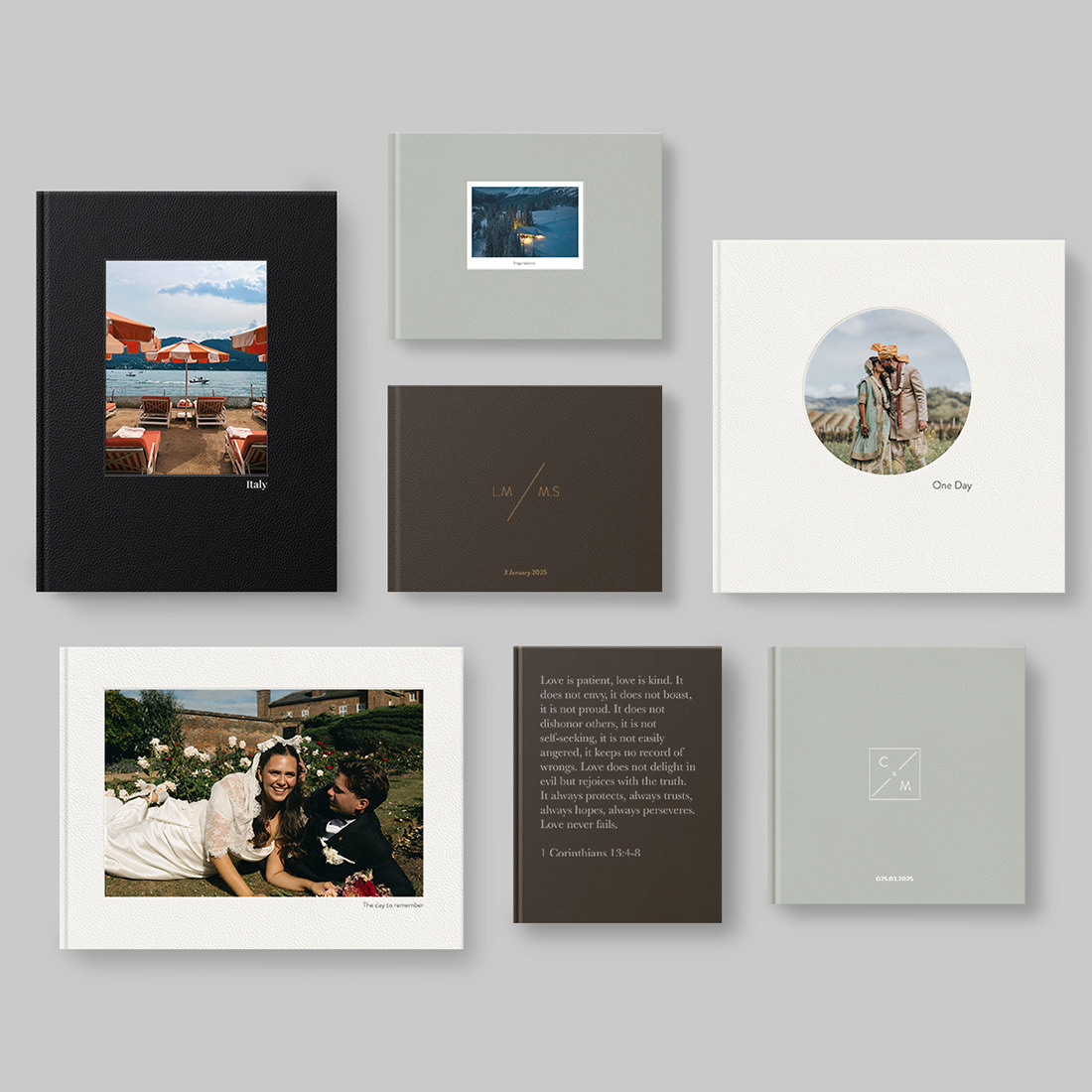 Leather Photo Albums laid flat on table in grid pattern in various sizes and orientations.