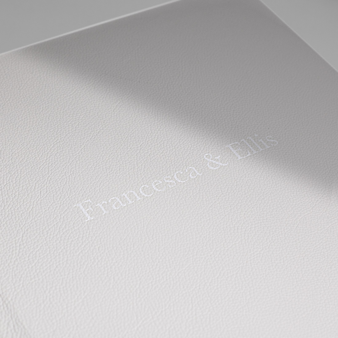 Elegant subtly raised ink titles.