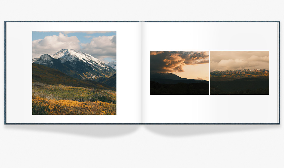A photo book featuring several photos of mountains in Colorado with yellow flowers and lush green hills.