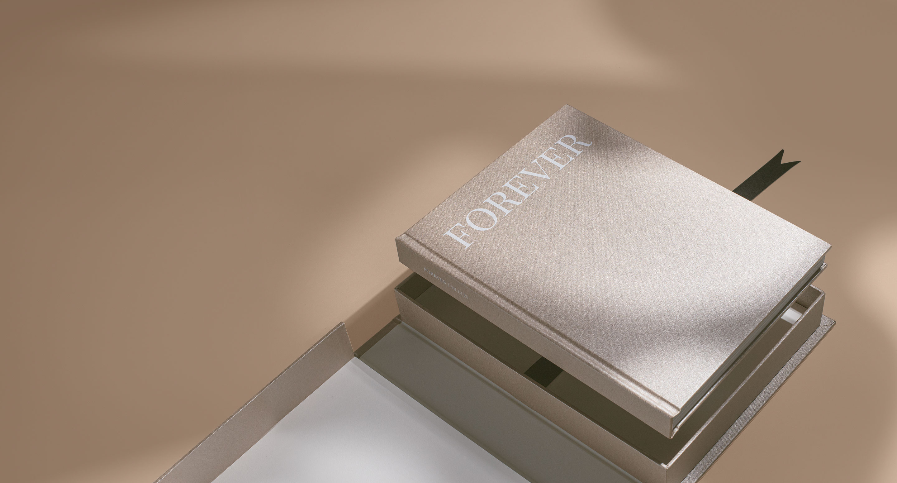A Portrait Premium Photo Book with a Champagne Coated Cloth cover in a Presentation Box.