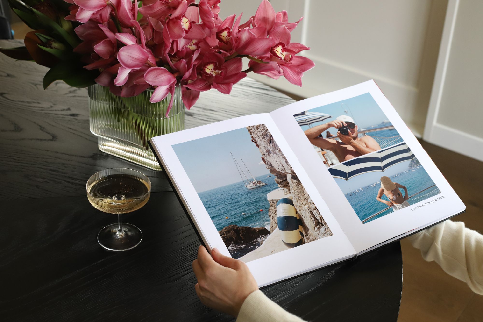 Open photo book with travel photos