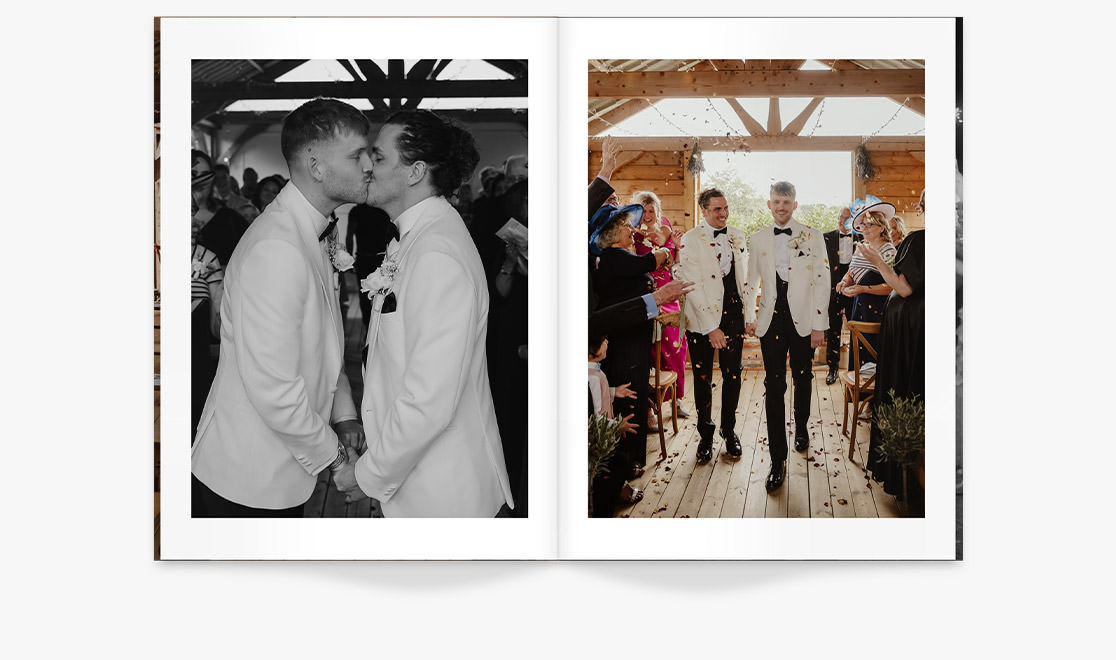 Open Large Wedding Magazine with newlywed male couple wearing matching attire.