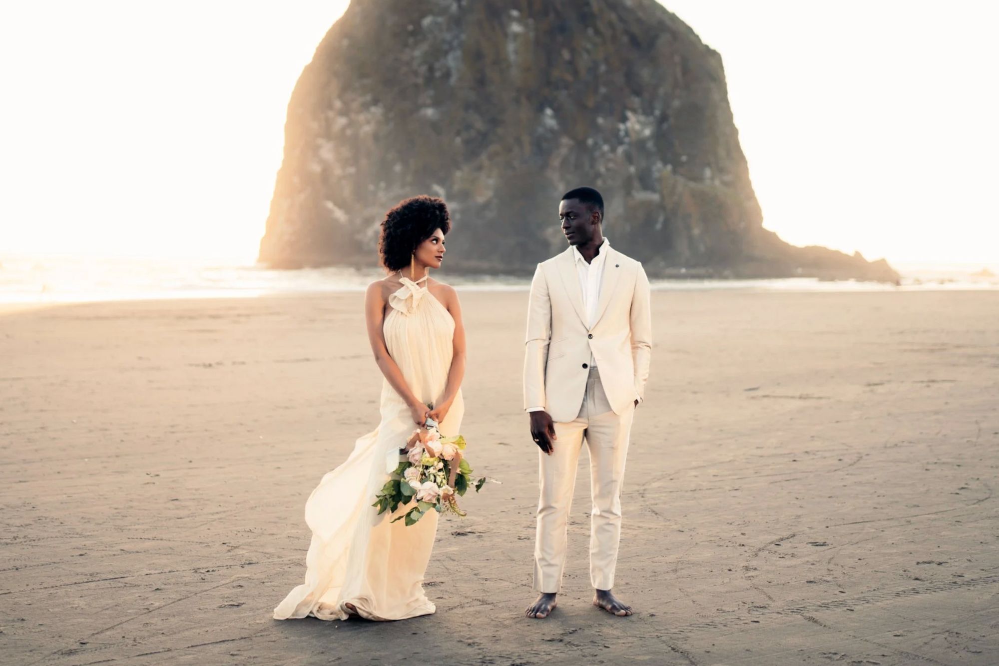 Couple looking at eachother on beach