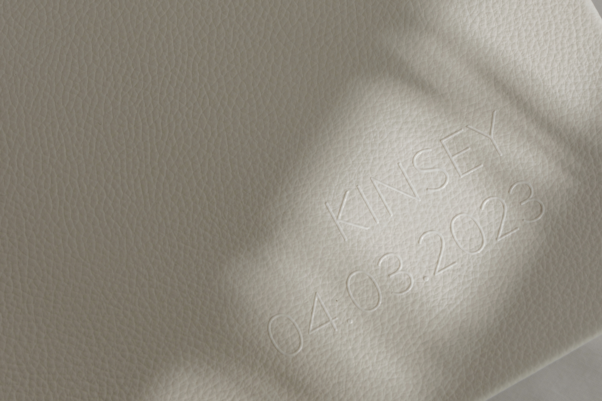 Close up of subtly raised text on book