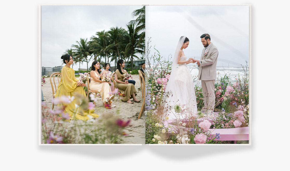 Open Large Portrait Premium Photo Book featuring a wedding on a beach covered in pink, yellow and green florals.