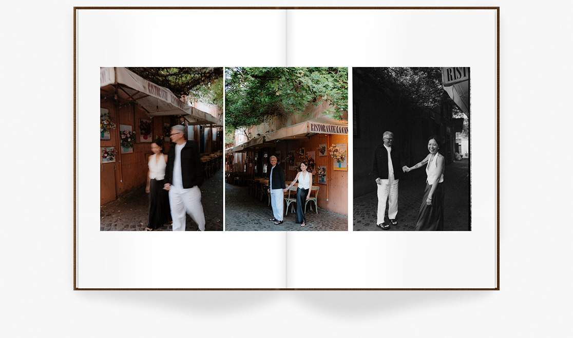 Open Premium Photo Book with photos of couple holding hands walking through cobblestone streets.
