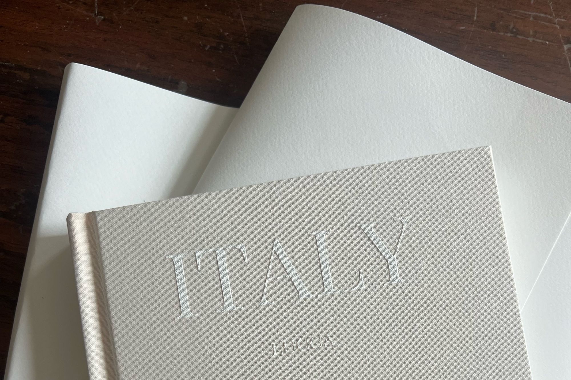 Close up of viral Italy Photo Book cover design.