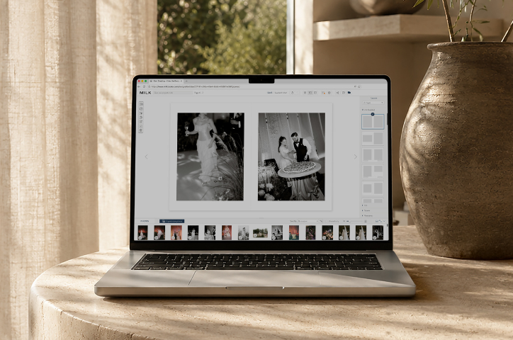 The online Design Studio on a Macbook in the process of creating a photo book.