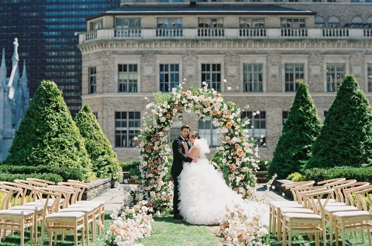 Couple in front of alter kissing