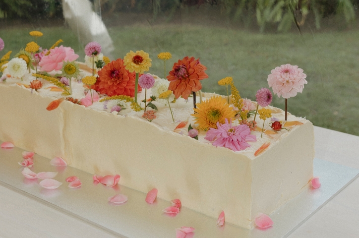 Three tiered wedding cake with caramel drizzle