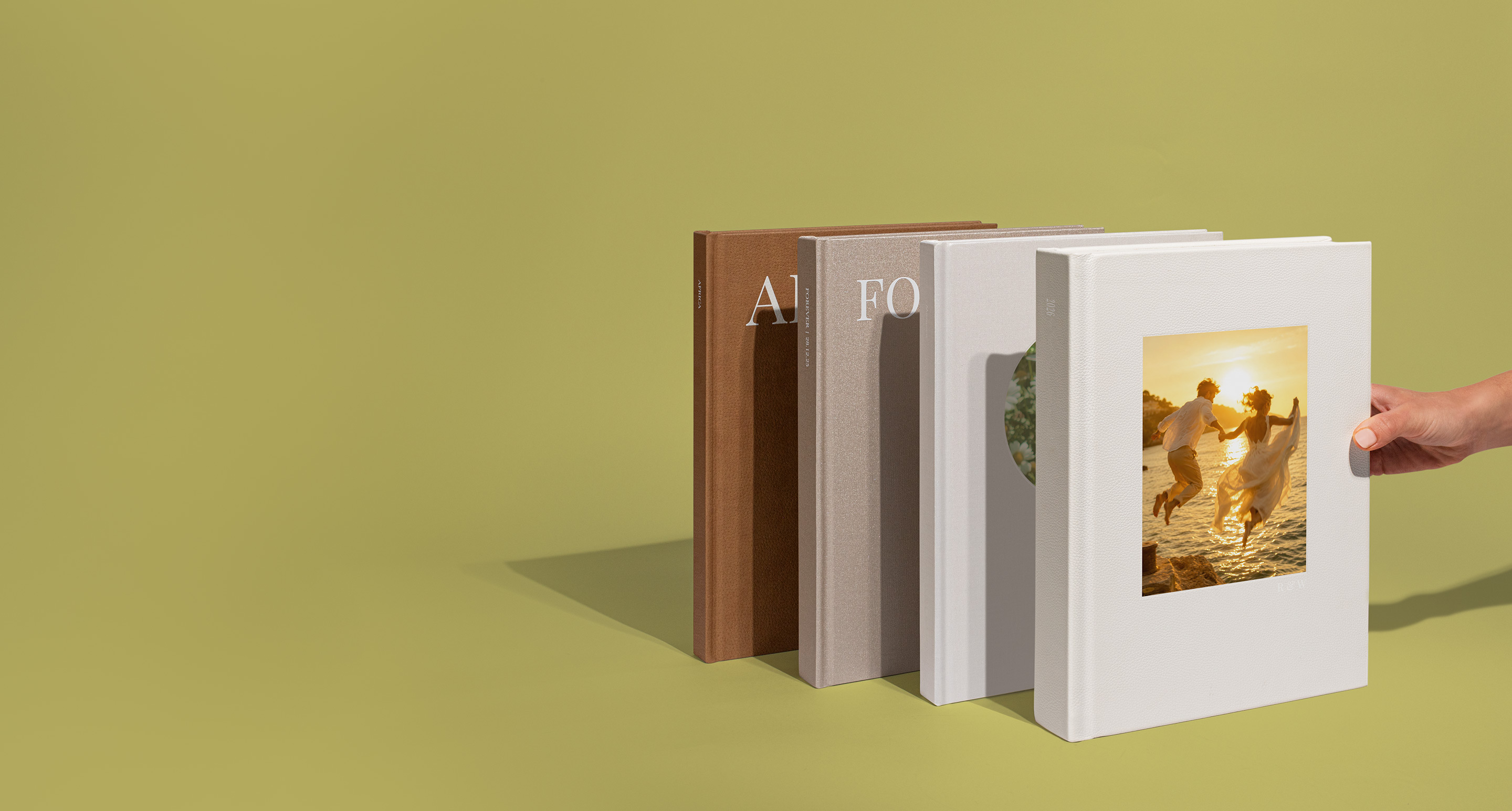 Standing Photo Albums on a green background
