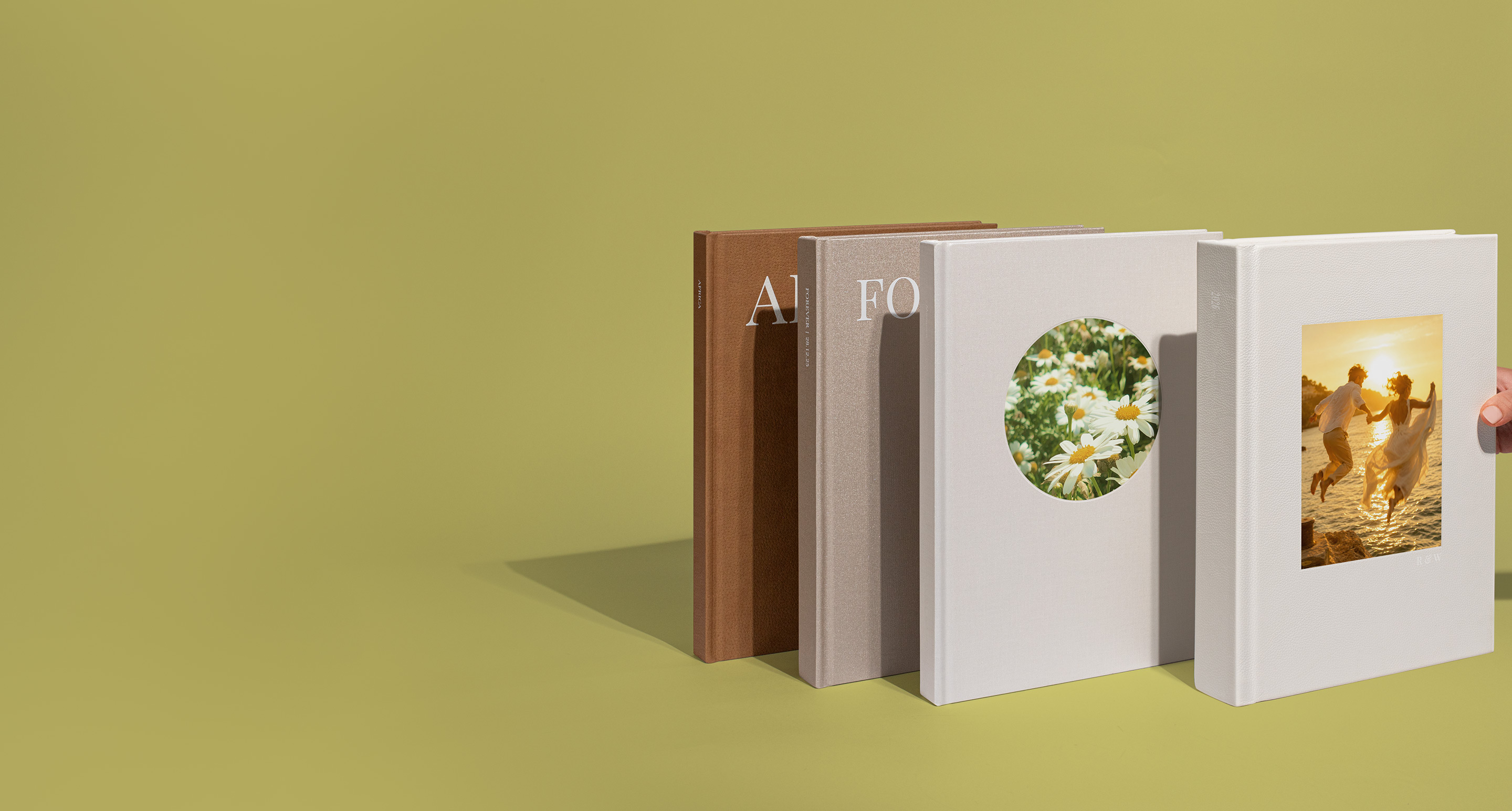 Standing Photo Albums on a green background
