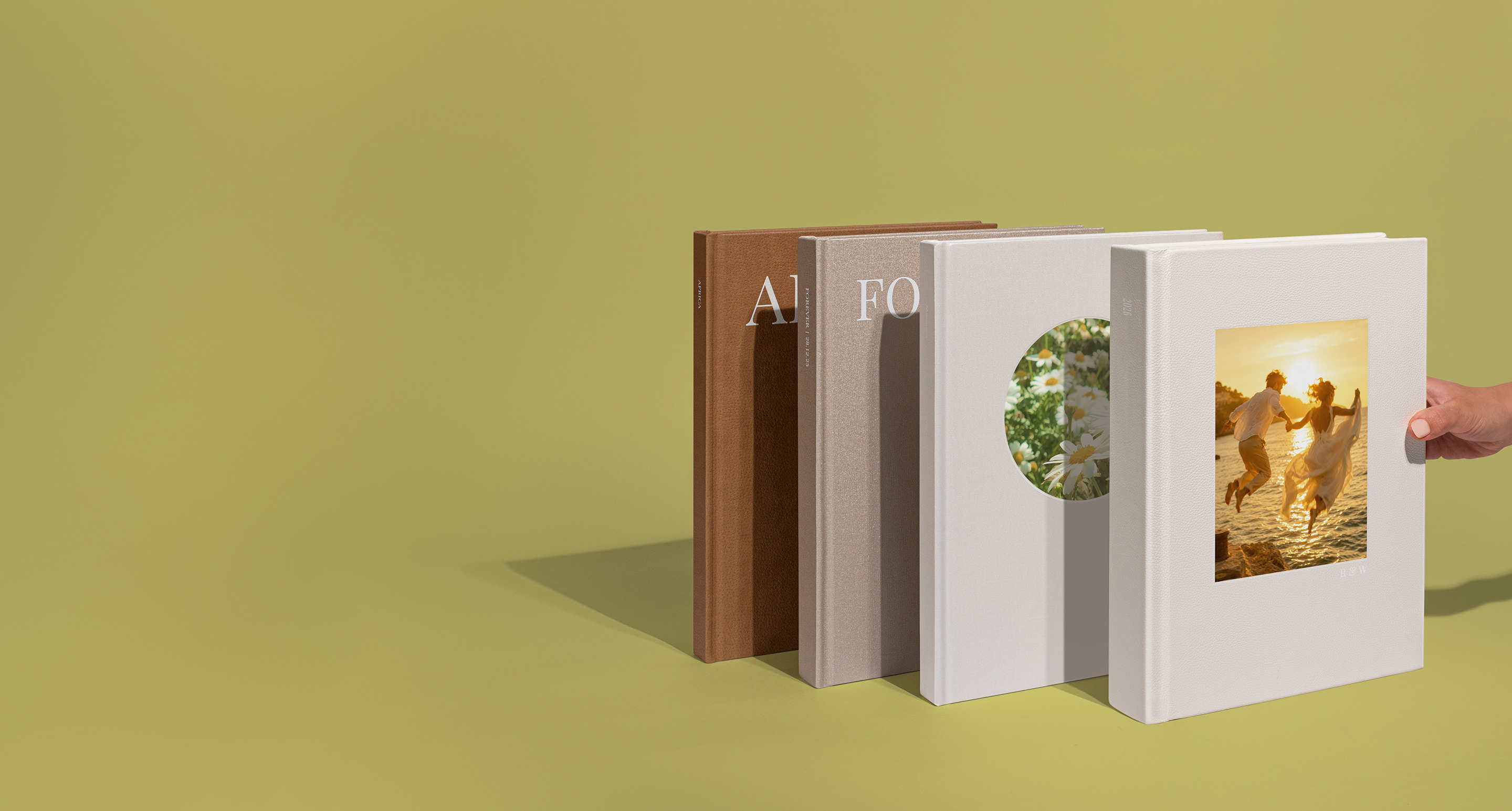 Standing Photo Albums on a green background