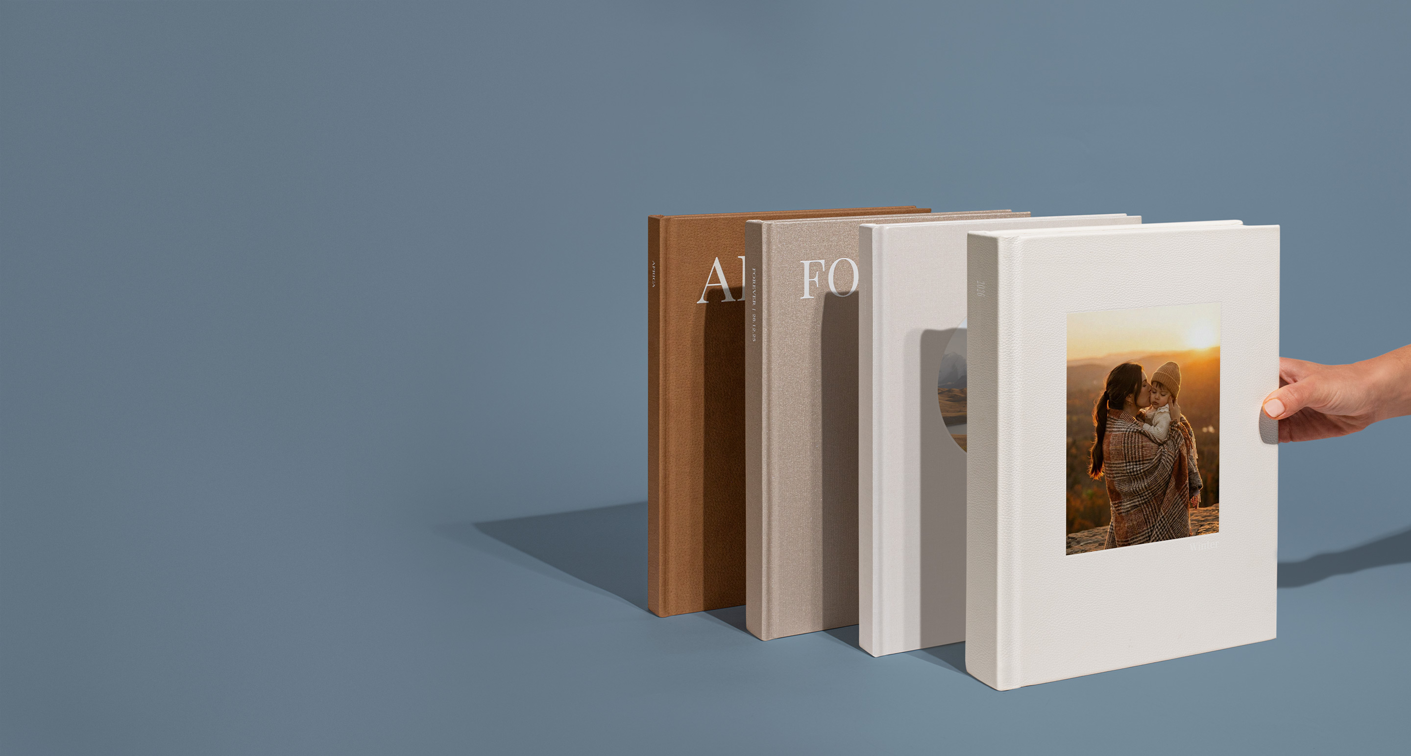 Standing Photo Albums on a blue background