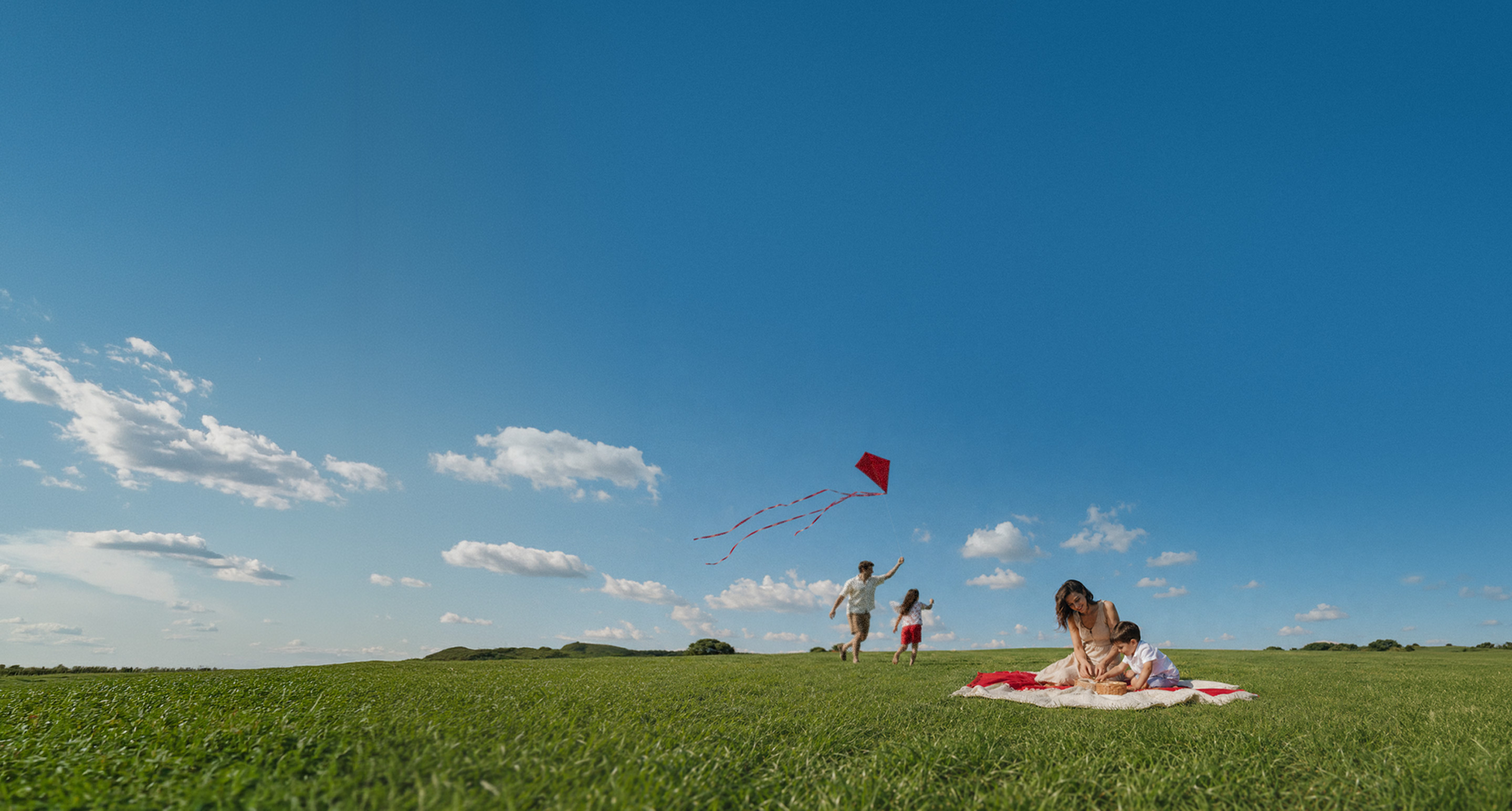 Family playing in a field