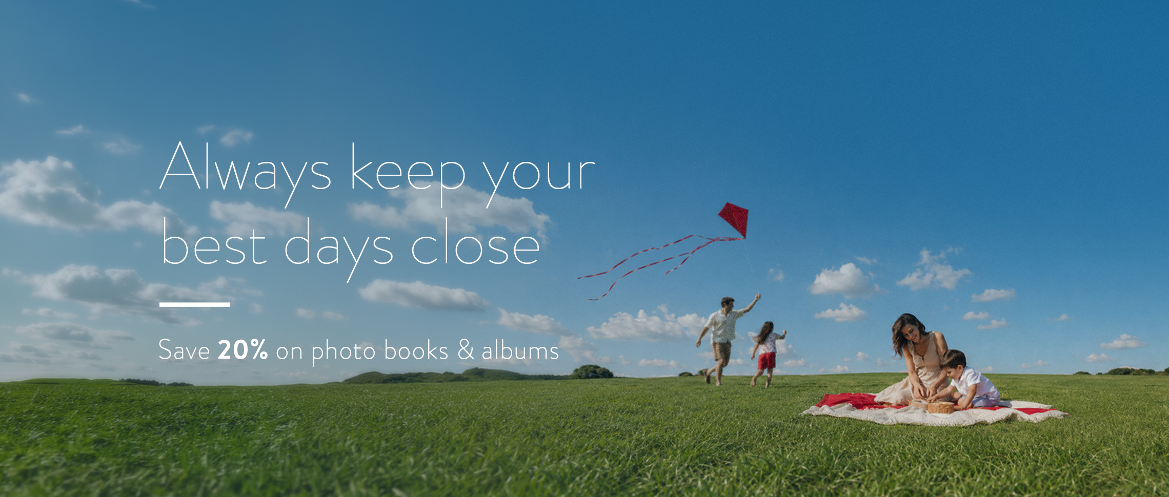 A family playing on a field - save 20% with Family Photo Week
