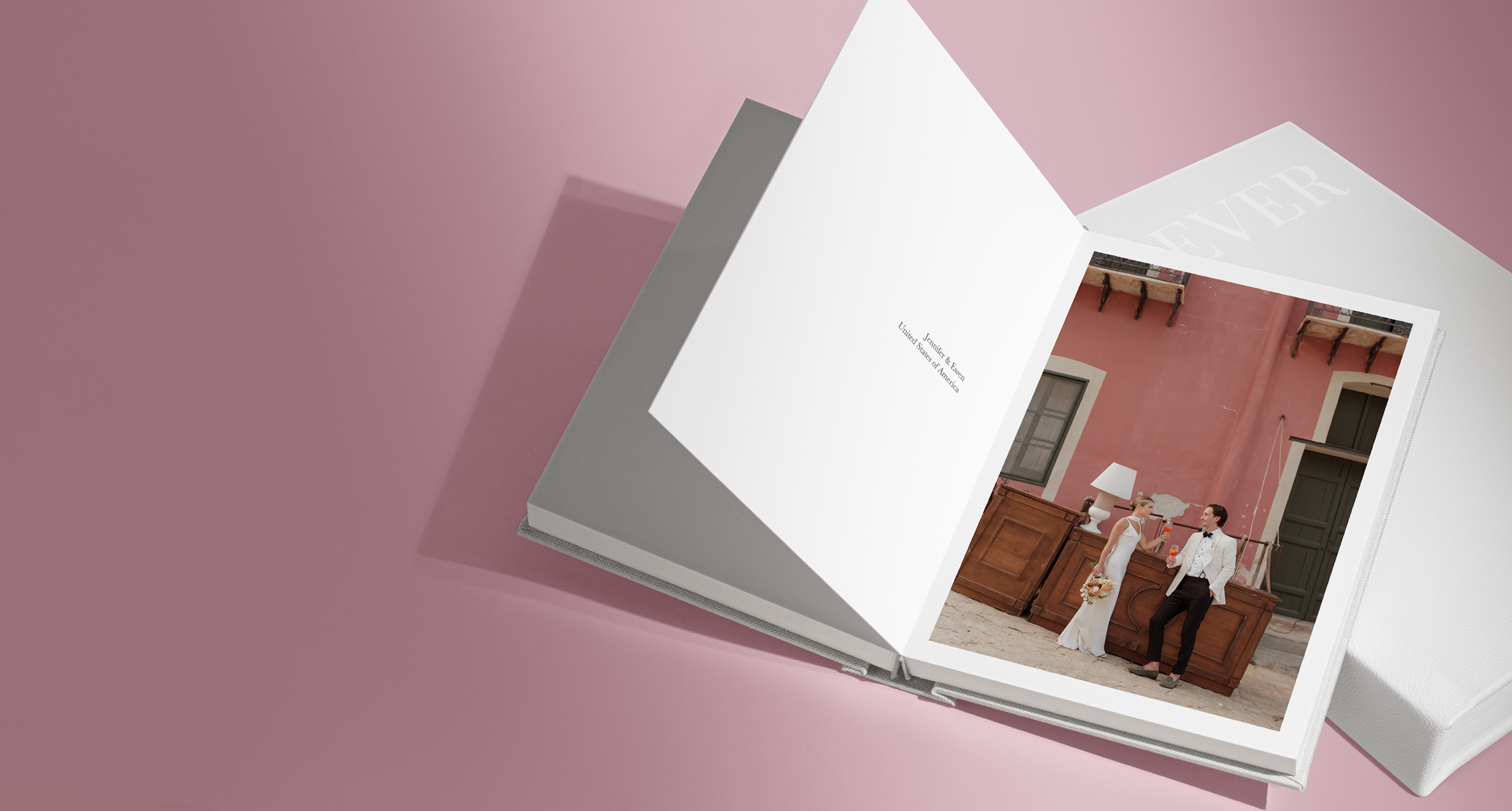 Couple getting married image on a photo book with a pink background