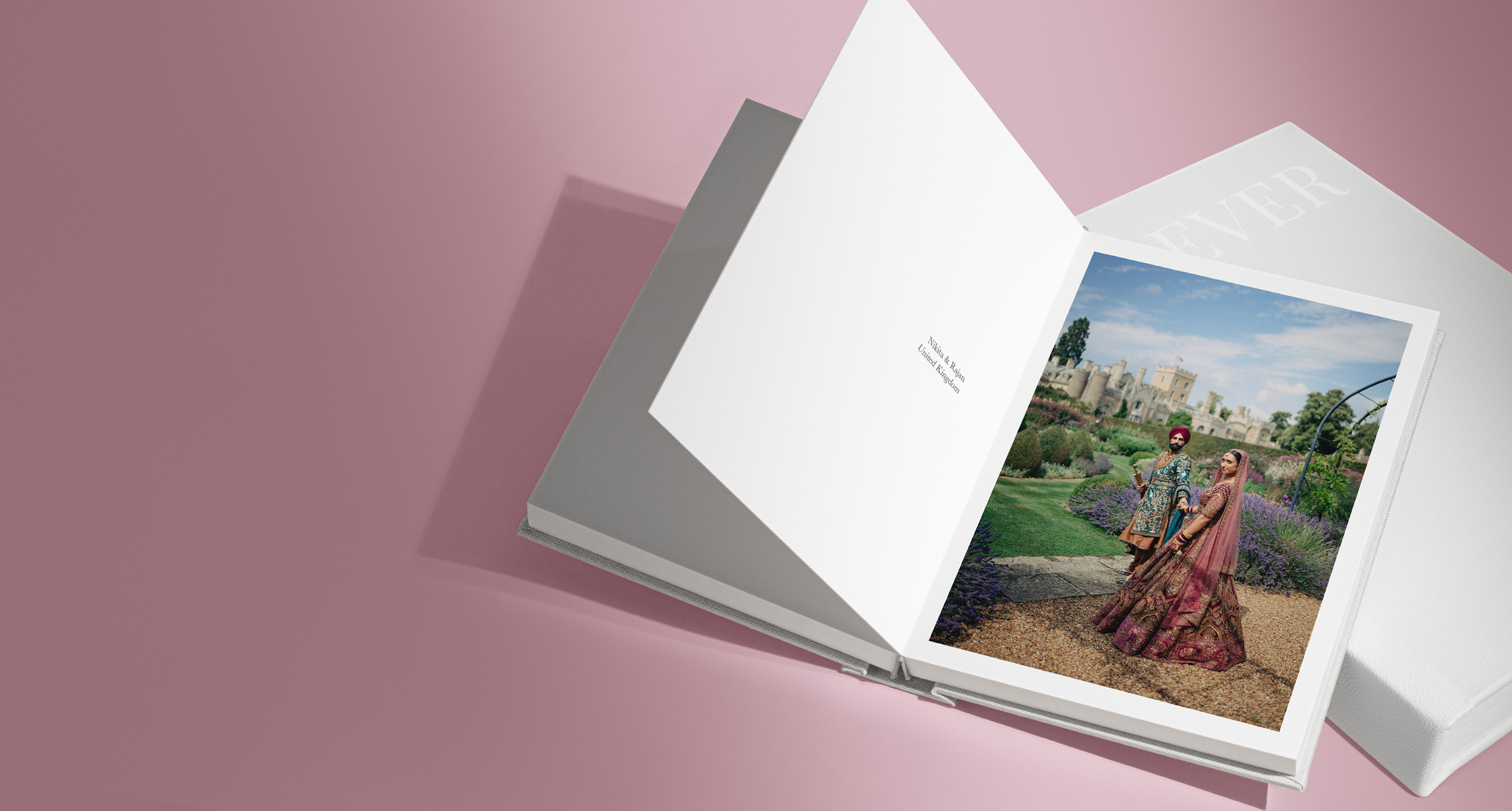 Couple getting married image on a photo book with a pink background